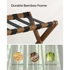 SONGMICS Bamboo Luggage Rack Foldable Suitcase Stand with Fabric Storage Shelf - 4 of 4