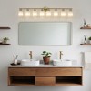 DAKAFUL Modern Bathroom Vanity Light, 4/5/6//8/10-Light Vanity Fixtures with Clear Glass Shade, Reversible Wall Sconces Over Mirror,for Bedroom - 3 of 4