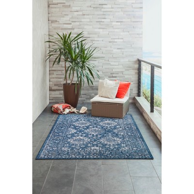 Nautical Navy Floral Round Synthetic Indoor/Outdoor Rug