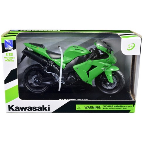 green kawasaki ninja with green rims