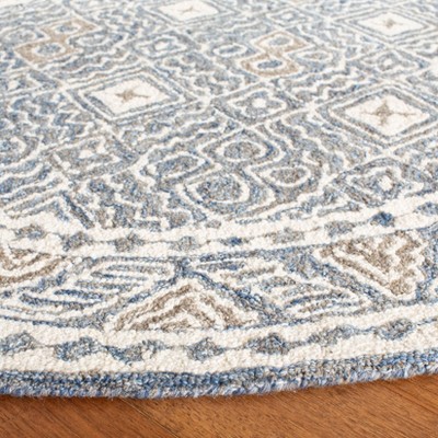 Hand-Tufted Blue and Ivory Wool Round Area Rug
