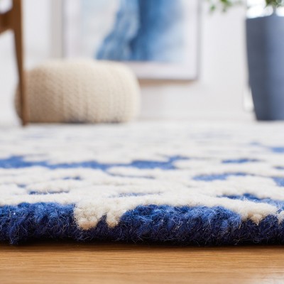 Ivory and Navy Hand Tufted Wool 4' x 6' Area Rug