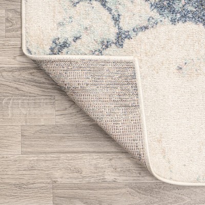 Blue and Cream Abstract 8' x 10' Synthetic Area Rug