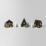 12pc Battery Operated Lit Metal House with Bottle Brush Trees and Snowmen Christmas Village Set - Wondershop™ Black