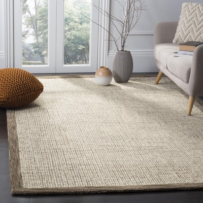 Ivory Abstract Tufted Wool Rectangular Rug 8' x 10'