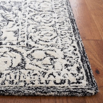 Handmade Black and Ivory Wool Tufted Square Rug