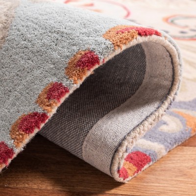 Hand-Tufted Blue and Beige Wool Floral Area Rug, 5' x 8'