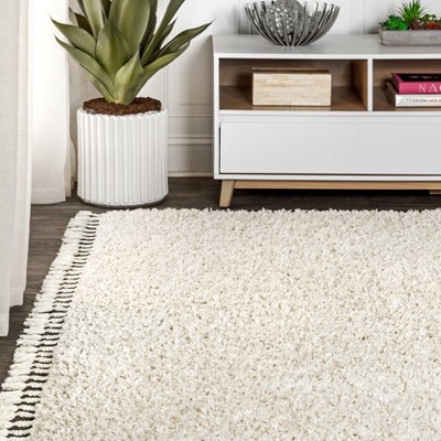 Cream 8' x 10' Reversible Shag Area Rug with Tassels
