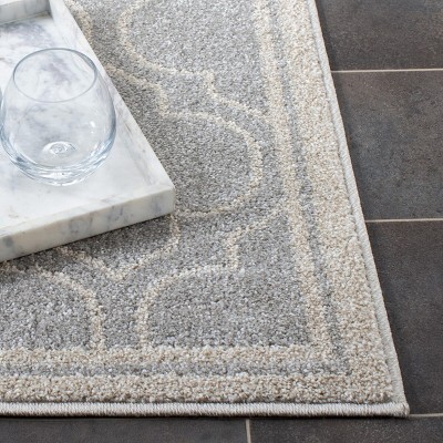 Ivory and Light Grey Geometric Synthetic 6' x 9' Area Rug