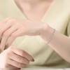 14K Gold-Plated Tennis Bracelet featuring 4mm Cubic Zirconia and a secure magnetic lock, combining luxury with practicality for a refined look. - 3 of 3