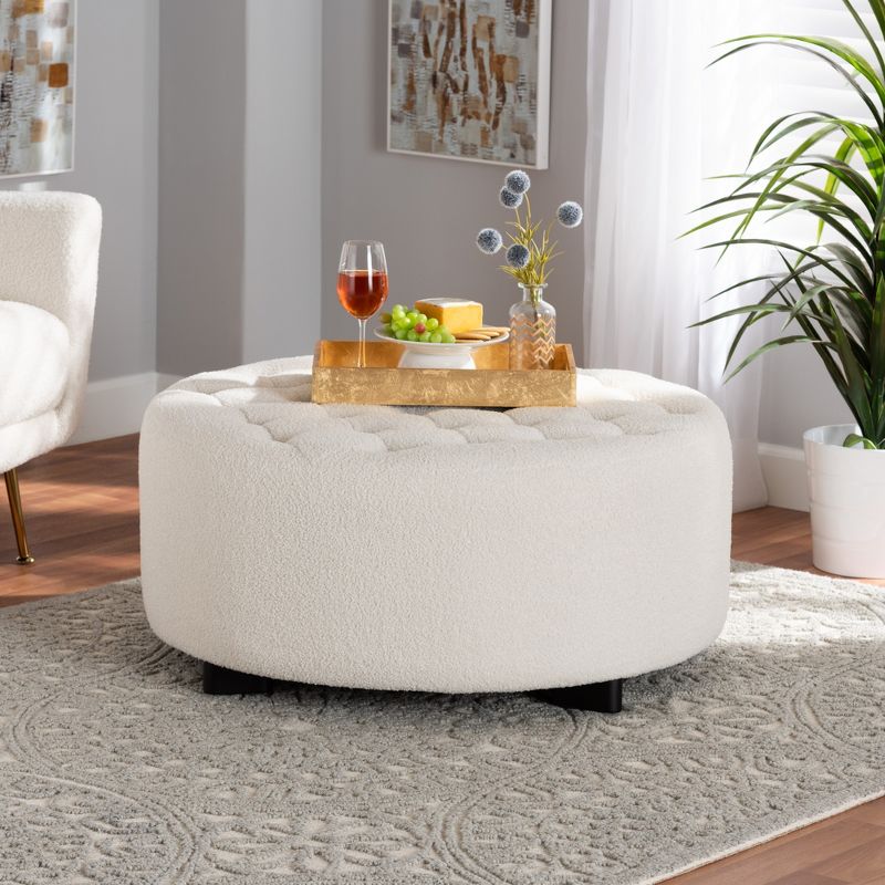 Baxton Studio Athena Modern and Contemporary Ivory Boucle Upholstered and Black Finished Wood Round Ottoman, 1 of 7