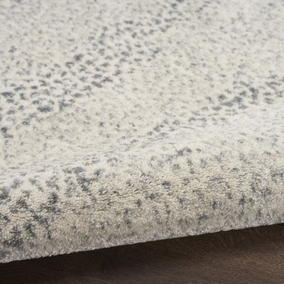 Beige and Gray Abstract Synthetic Rectangular Rug 7'10" x 10'6"