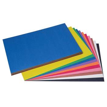 multicolored pastel construction paper fanned out with colorful ink