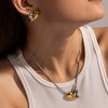 Curved Heart Earrings for Women by Ginger Lyne | Large Gold Two-Tone Stainless Studs for Her - 3 of 4