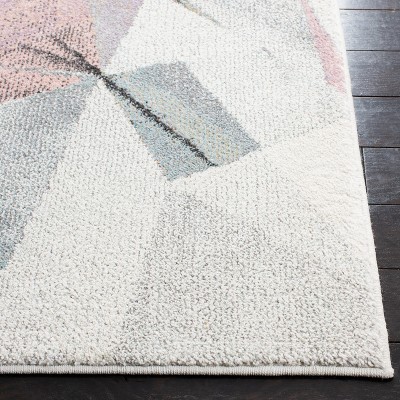 Ivory and Pink Geometric Floral 4' x 6' Synthetic Area Rug