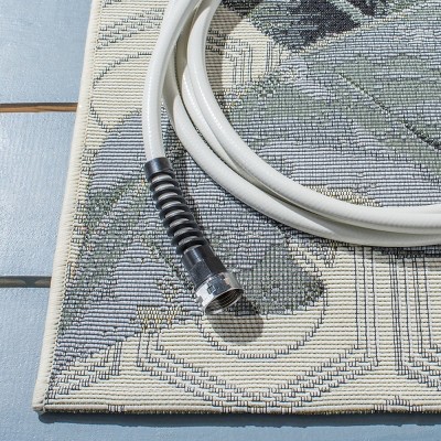 Tropical Paradise Gray Synthetic 9'10" x 12'5" Easy-Care Outdoor Rug