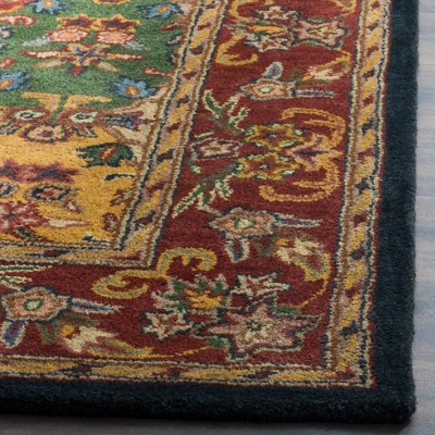 Handmade Multi/Burgundy Tufted Wool Oval 6' x 9' Area Rug