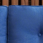 blue cushion/brown wicker