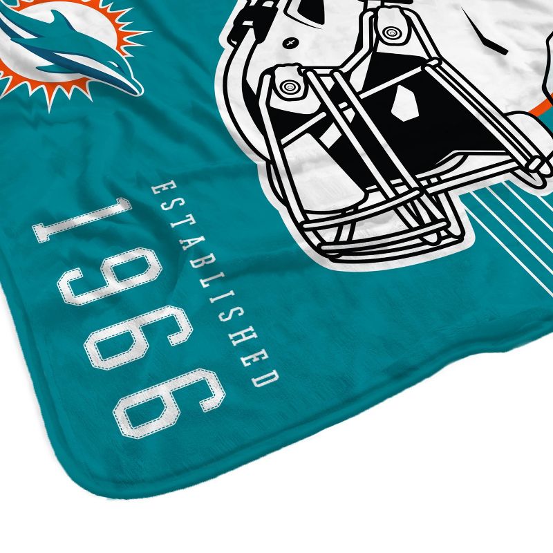 NFL Miami Dolphins Helmet Stripes Flannel Fleece Blanket, 3 of 4
