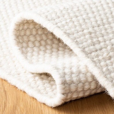 Ivory Hand Tufted Wool 8' x 10' Area Rug