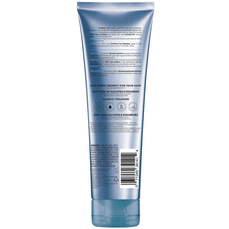 A blue colored conditioner tube with text detailing it is 100% free of sulfates and parabens, and a visible barcode at the bottom.