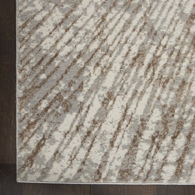 Gray and Gold Abstract 8' x 10' Synthetic Area Rug