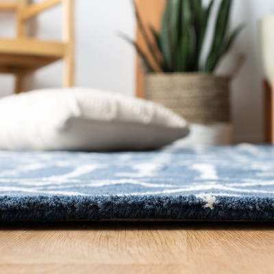 Ivory 9' x 12' Tufted Wool and Viscose Handmade Rug