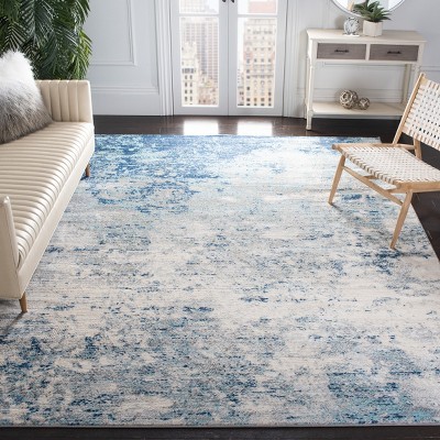 Grey and Blue Abstract 8' x 10' Synthetic Area Rug