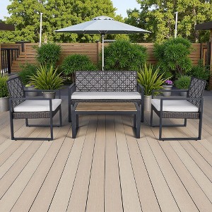 4-Piece Outdoor Patio Rattan Conversation Sofa Set with Acacia Wood Coffee Table and 2 Armchairs - 1 of 4