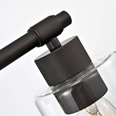 Transitional Rubbed Bronze 4-Light Bath Vanity Fixture with Clear Glass Shades