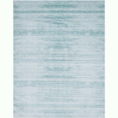 Turquoise and Ivory 8' x 10' Washable Synthetic Area Rug