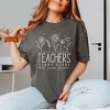 Simply Sage Market Women's Teachers Plant Seeds That Grow Forever Short Sleeve Garment Dyed Tee - 2 of 4