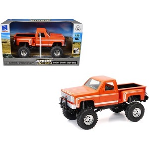 Chevrolet Sport Step Side Pickup Truck Orange with White Graphics "Xtreme Off-Road" Series 1/30 Diecast Model by New Ray - 1 of 3