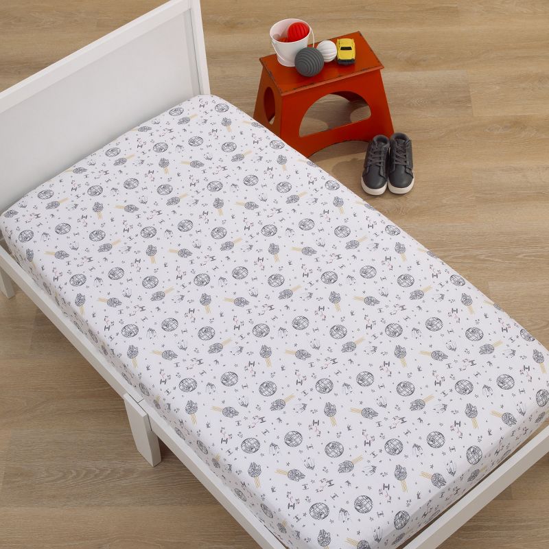 Star Wars May The Force Be With You White and Gold Millennium Falcon and Death Star Nursery Fitted Crib Sheet, 4 of 6