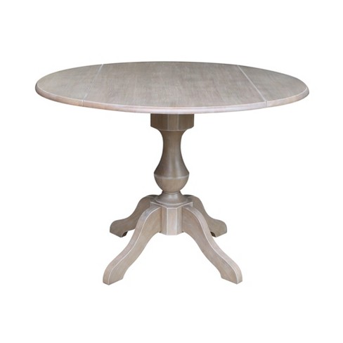 Kayden Round Dual Drop Leaf Pedestal Table Washed Gray Taupe - International Concepts - image 1 of 4