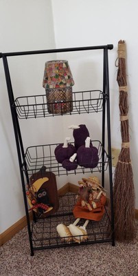 Storage Baskets on a Ladder in Three Tiers