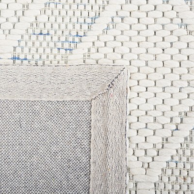 Ivory and Light Blue Geometric Wool Area Rug, 5' x 8'
