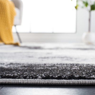 Jasper Black and Ivory Abstract Square Synthetic Rug