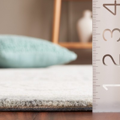 Ivory and Grey Hand Tufted Wool 4' x 6' Area Rug