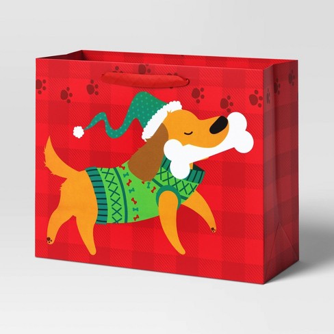 Dachshund Puppy With Gift Wrapped Present by Brand New Images