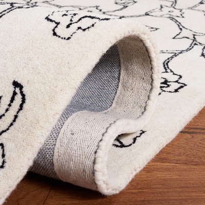 Ivory and Black Floral Hand-Tufted Wool Area Rug 4' x 6'