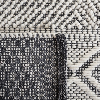 Handmade Black and Ivory Wool Area Rug 3' x 5'