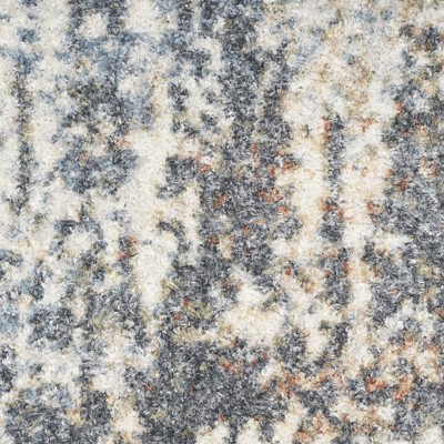 Ivory Abstract Synthetic 3'3" x 5' Easy-Care Area Rug