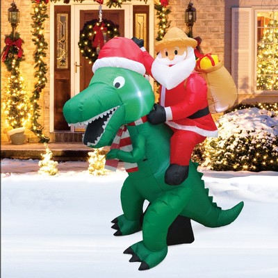 8-Foot Inflatable Santa on Green Dinosaur Lawn Decoration