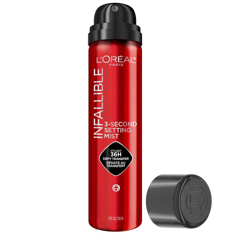 Red colored spray bottle labeled "L'Oréal Paris Infallible 3-Second Setting Mist" with a black cap placed beside it.