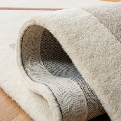 Ivory and Black Hand Tufted Wool Runner Rug