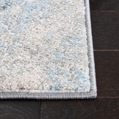 Boho-Chic Ivory/Blue Synthetic 9' x 12' Reversible Area Rug