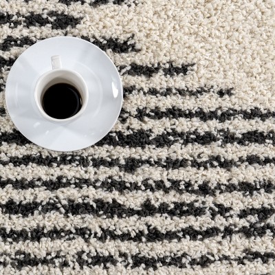 Off-White Synthetic Square Shag Rug with Braided Tassels