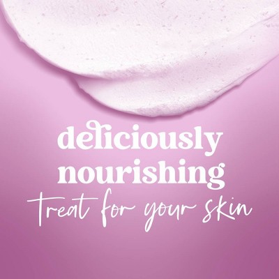 Text reads: "deliciously nourishing Treat for your skin" in bold white and cursive fonts on a pink background with creamy texture and bubbles. 