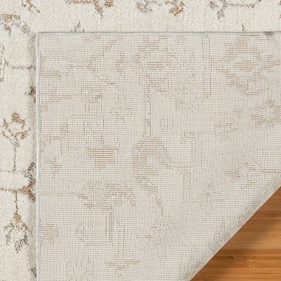 Joeri Cream Tufted Rectangular 5' x 7' Synthetic Area Rug
